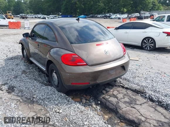 ✅ 2014 Volkswagen Beetle 1.8T • VIN: 3VWJ07AT2EM664064 • Lot: 43036687. Listed on IAAI with 112,000 mi. Free auction sales archive from the USA and detailed vehicle history report at DreamBid. Image 3.