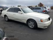 ✅ 1997 Infiniti Q45 • VIN: JNKBY31A3VM302696 • Lot: 82445985. Wystawiony na Copart z przebiegiem 168 809 mil. Bezpłatny archiwum sprzedaży aukcyjnych z USA i szczegółowy raport historii pojazdu na DreamBid. Zdjęcie 4.