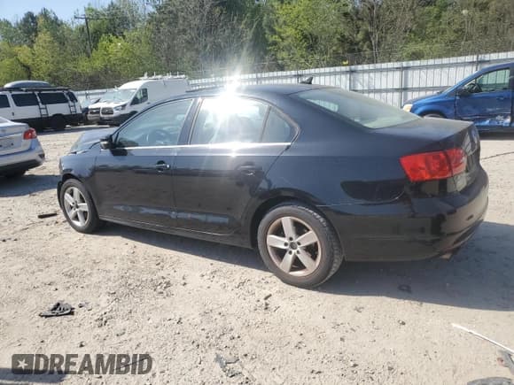 ✅ 2013 Volkswagen Jetta TDI w/Premium • VIN: 3VWLL7AJ5DM389660 • Lot: 53796405. Listed on Copart with 82,151 mi. Free auction sales archive from the USA and detailed vehicle history report at DreamBid. Image 2.