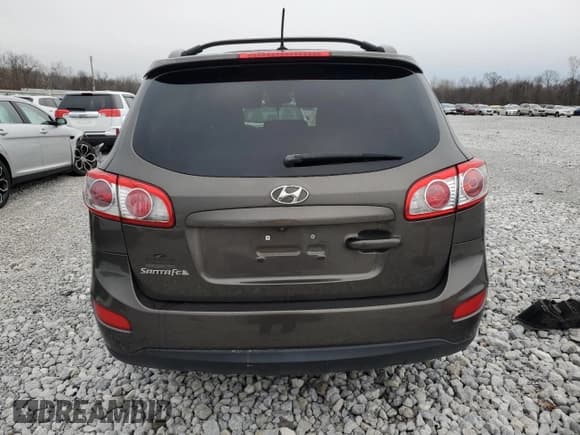 ✅ 2012 Hyundai Santa Fe SE • VIN: 5XYZH4AG8CG153999 • Lot: 82546424. Listed on Copart with 87,737 mi. Free auction sales archive from the USA and detailed vehicle history report at DreamBid. Image 6.