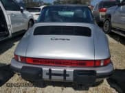 ✅ 1986 Porsche 911 • VIN: WP0EB0917GS161455 • Lot: 74672764. Wystawiony na Copart z przebiegiem 80 076 mil. Bezpłatny archiwum sprzedaży aukcyjnych z USA i szczegółowy raport historii pojazdu na DreamBid. Zdjęcie 6.
