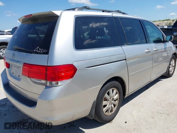 ✅ 2009 Honda Odyssey EX-L • VIN: 5FNRL38719B052351 • Lot: 43007504. Wystawiony na IAAI z przebiegiem 284 958 mil. Bezpłatny archiwum sprzedaży aukcyjnych z USA i szczegółowy raport historii pojazdu na DreamBid. Zdjęcie 4.