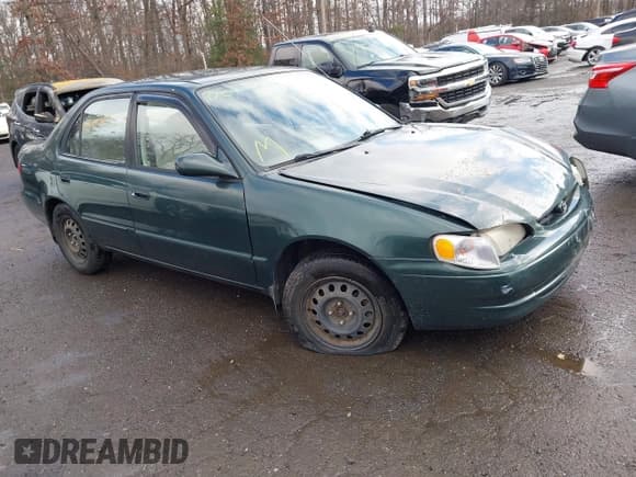 ✅ 2000 Toyota Corolla VE • VIN: 2T1BR18EXYC334347 • Lot: 43777101. Listed on IAAI with 171,626 mi. Free auction sales archive from the USA and detailed vehicle history report at DreamBid. Image 1.