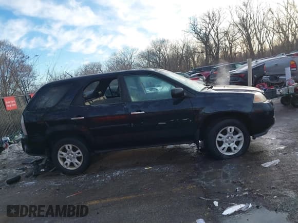 ✅ 2004 Acura MDX Touring • VIN: 2HNYD18634H556160 • Lot: 41396287. Listed on IAAI with 243,292 mi. Free auction sales archive from the USA and detailed vehicle history report at DreamBid. Image 13.