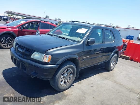 ✅ 2004 Isuzu Rodeo S • VIN: 4S2CK58YX44311680 • Lot: 42476361. Listed on IAAI with 154,693 mi. Free auction sales archive from the USA and detailed vehicle history report at DreamBid. Image 6.