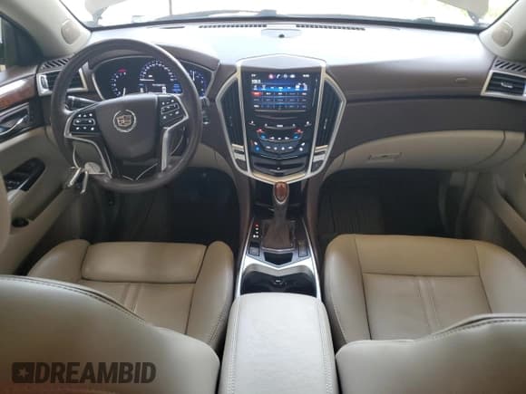 ✅ 2016 Cadillac SRX Premium Collection • VIN: 3GYFNDE34GS552894 • Lot: 64945985. Listed on Copart with 105,751 mi. Free auction sales archive from the USA and detailed vehicle history report at DreamBid. Image 8.