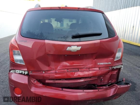 ✅ 2014 Chevrolet Captiva Sport LT • VIN: 3GNAL3EK3ES572050 • Лот: 84675804. Опубликован ранее на Copart с пробегом 70 025 миль. Бесплатный доступ к архиву аукционных продаж из США и подробный отчёт об истории автомобиля на DreamBid. Изображение 6.