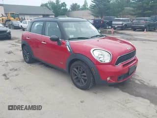 ✅ 2014 MINI Countryman S • VIN: WMWZC5C50EWP39566 • Lot: 42456424. Listed on IAAI with 99,518 mi. Free auction sales archive from the USA and detailed vehicle history report at DreamBid. Image 1.