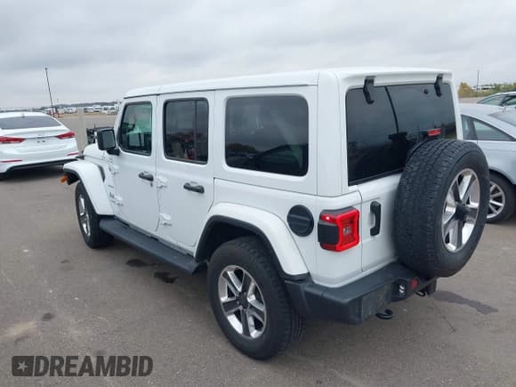 ✅ 2021 Jeep Wrangler Unlimited Sahara • VIN: 1C4HJXEG4MW748395 • Lot: 43569883. Listed on IAAI with 93,704 mi. Free auction sales archive from the USA and detailed vehicle history report at DreamBid. Image 3.