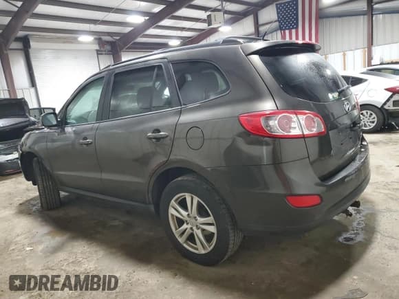 ✅ 2011 Hyundai Santa Fe SE • VIN: 5XYZHDAG8BG061824 • Lot: 77025964. Listed on Copart with 149,741 mi. Free auction sales archive from the USA and detailed vehicle history report at DreamBid. Image 2.
