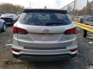 ✅ 2017 Hyundai Santa Fe 2.4L • VIN: 5XYZUDLB2HG464851 • Лот: 74073953. Опубликован ранее на Copart с пробегом 72 694 миль. Бесплатный доступ к архиву аукционных продаж из США и подробный отчёт об истории автомобиля на DreamBid. Изображение 6.