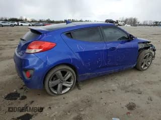 ✅ 2013 Hyundai Veloster Turbo • VIN: KMHTC6AEXDU105138 • Lot: 87456924. Wystawiony na Copart z przebiegiem 100 773 mil. Bezpłatny archiwum sprzedaży aukcyjnych z USA i szczegółowy raport historii pojazdu na DreamBid. Zdjęcie 3.