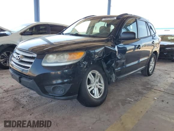 ✅ 2012 Hyundai Santa Fe GLS • VIN: 5XYZGDAB4CG155854 • Lot: 70053684. Listed on Copart with 251,318 mi. Free auction sales archive from the USA and detailed vehicle history report at DreamBid. Image 1.