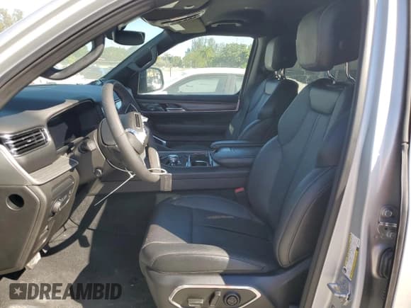 ✅ 2023 Jeep Wagoneer Series II Carbide • VIN: 1C4SJVBPXPS515860 • Lot: 43043645. Listed on Copart with 16,875 mi. Free auction sales archive from the USA and detailed vehicle history report at DreamBid. Image 7.