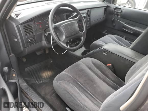 2002 Dodge Dakota z VIN 1B7GL12X22S589971, wystawiony jako Copart lot #79740174 z przebiegiem 183 718 mil mil oraz Czysty tytuł • Clean title. Historia ofert i sprzedaży dostępna na DreamBid. Obrazek 8.