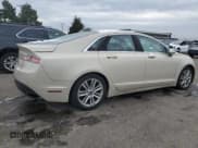 ✅ 2014 Lincoln MKZ • VIN: 3LN6L2G92ER812307 • Lot: 91967995. Wystawiony na Copart z przebiegiem 156 509 mil. Bezpłatny archiwum sprzedaży aukcyjnych z USA i szczegółowy raport historii pojazdu na DreamBid. Zdjęcie 3.