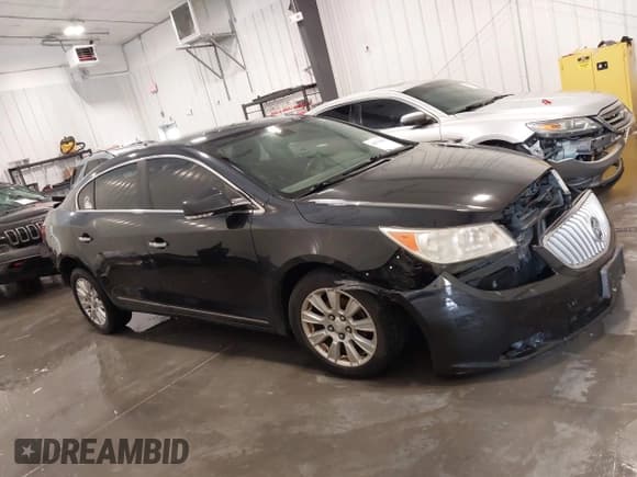 ✅ 2012 Buick LaCrosse Leather • VIN: 1G4GC5ERXCF274880 • Лот: 42570186. Опубликован ранее на IAAI с пробегом 180 141 миль. Бесплатный доступ к архиву аукционных продаж из США и подробный отчёт об истории автомобиля на DreamBid. Изображение 14.