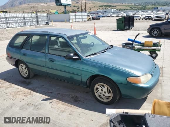 ✅ 1998 Ford Escort SE • VIN: 3FAFP15P5WR230715 • Lot: 58982595. Listed on Copart with 112,250 mi. Free auction sales archive from the USA and detailed vehicle history report at DreamBid. Image 4.