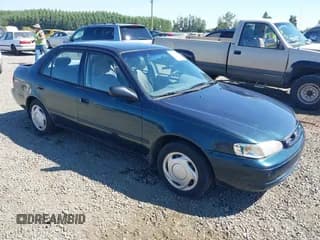 ✅ 1999 Toyota Corolla VE • VIN: 1NXBR12E6XZ156717 • Лот: 42814811. Опубликован ранее на IAAI с пробегом 144 782 миль. Бесплатный доступ к архиву аукционных продаж из США и подробный отчёт об истории автомобиля на DreamBid. Изображение 1.