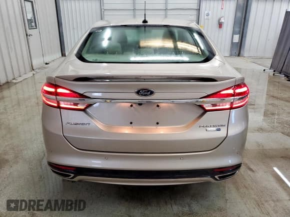 ✅ 2017 Ford Fusion Platinum • VIN: 3FA6P0D98HR100136 • Lot: 83815345. Listed on Copart with 99,002 mi. Free auction sales archive from the USA and detailed vehicle history report at DreamBid. Image 6.