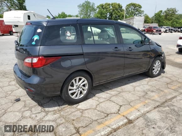 ✅ 2015 Mazda 5 Sport • VIN: JM1CW2BL4F0184530 • Лот: 56965755. Опубликован ранее на Copart с пробегом 144 873 миль. Бесплатный доступ к архиву аукционных продаж из США и подробный отчёт об истории автомобиля на DreamBid. Изображение 3.