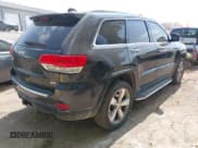 ✅ 2014 Jeep Grand Cherokee Overland • VIN: 1C4RJFCT9EC209899 • Lot: 43245850. Listed on IAAI with 166,819 mi. Free auction sales archive from the USA and detailed vehicle history report at DreamBid. Image 4.