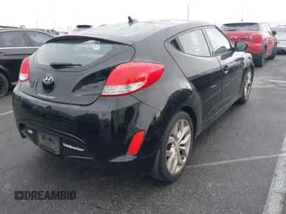 ✅ 2013 Hyundai Veloster w/Gray Int • VIN: KMHTC6AD6DU172892 • Lot: 41518462. Wystawiony na IAAI z przebiegiem 167 251 mil. Bezpłatny archiwum sprzedaży aukcyjnych z USA i szczegółowy raport historii pojazdu na DreamBid. Zdjęcie 4.