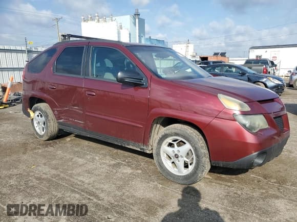 ✅ 2003 Pontiac Aztek • VIN: 3G7DA03E53S586194 • Lot: 77698474. Listed on Copart with 112,779 mi. Free auction sales archive from the USA and detailed vehicle history report at DreamBid. Image 4.