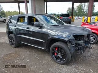 ✅ 2014 Jeep Grand Cherokee SRT-8 • VIN: 1C4RJFDJ1EC289423 • Lot: 43335805. Wystawiony na IAAI z przebiegiem Nie podano. Bezpłatny archiwum sprzedaży aukcyjnych z USA i szczegółowy raport historii pojazdu na DreamBid. Zdjęcie 1.