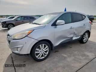 2013 Hyundai Tucson GLS with VIN KM8JU3AC7DU566198, listed as a Copart auction lot 71479605 with 196,474 mi miles and Salvage title. Bid and sale history available at DreamBid. Image 1.