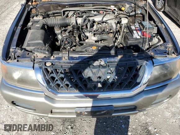 ✅ 2002 Mitsubishi Montero Sport XLS • VIN: JA4MT31R02P013455 • Lot: 79816674. Listed on Copart with 106,731 mi. Free auction sales archive from the USA and detailed vehicle history report at DreamBid. Image 12.