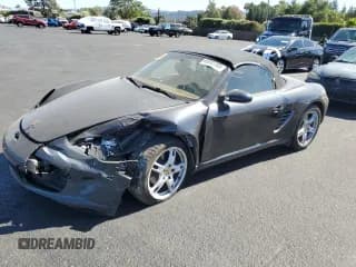 ✅ 2007 Porsche Boxster • VIN: WP0CA29857U712263 • Лот: 65982385. Опубликован ранее на Copart с пробегом 117 997 миль. Бесплатный доступ к архиву аукционных продаж из США и подробный отчёт об истории автомобиля на DreamBid. Изображение 1.