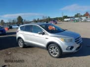 ✅ 2017 Ford Escape SE • VIN: 1FMCU9GD1HUD56858 • Lot: 43696316. Listed on IAAI with 130,024 mi. Free auction sales archive from the USA and detailed vehicle history report at DreamBid. Image 1.
