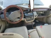 ✅ 2000 Cadillac DeVille • VIN: 1G6KD54Y7YU292053 • Lot: 77121214. Listed on Copart with Not provided. Free auction sales archive from the USA and detailed vehicle history report at DreamBid. Image 8.