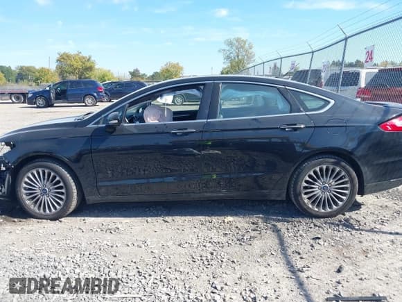 ✅ 2016 Ford Fusion Titanium • VIN: 3FA6P0D95GR272235 • Lot: 43354822. Listed on IAAI with 145,520 mi. Free auction sales archive from the USA and detailed vehicle history report at DreamBid. Image 15.