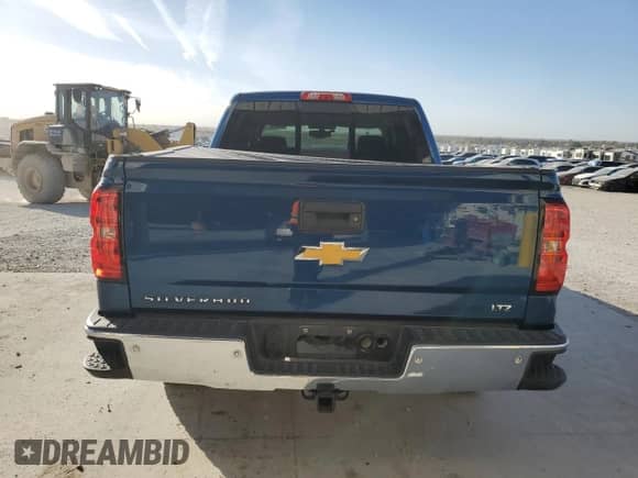 2015 Chevrolet Silverado 1500 LTZ with VIN 3GCUKSEC9FG525833, listed as a Copart auction lot 87082825 with 129,711 mi miles and Salvage title. Bid and sale history available at DreamBid. Image 6.