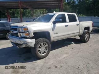 ✅ 2015 Chevrolet Silverado 1500 High Country • VIN: 3GCUKTEC2FG120080 • Лот: 80010275. Опубликован ранее на Copart с пробегом 171 026 миль. Бесплатный доступ к архиву аукционных продаж из США и подробный отчёт об истории автомобиля на DreamBid. Изображение 1.