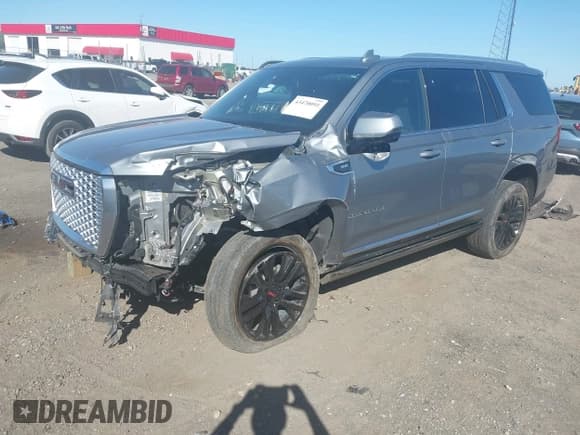 ✅ 2023 GMC Yukon Denali • VIN: 1GKS2DKL2PR371169 • Lot: 43470091. Listed on IAAI with 47,470 mi. Free auction sales archive from the USA and detailed vehicle history report at DreamBid. Image 2.