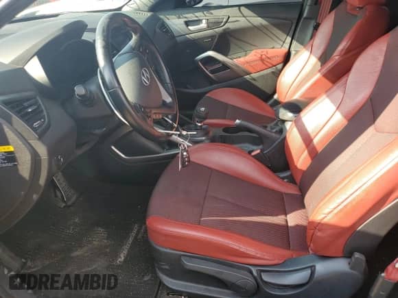 2016 Hyundai Veloster Turbo z VIN KMHTC6AE5GU256232, wystawiony jako Copart lot #70254494 z przebiegiem 84 305 mil mil oraz Szkoda całkowita • Salvage title. Historia ofert i sprzedaży dostępna na DreamBid. Obrazek 7.