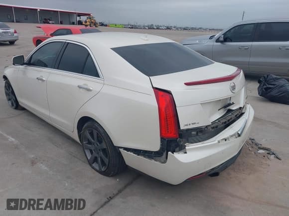 ✅ 2013 Cadillac ATS • VIN: 1G6AG5RX3D0138802 • Lot: 41192671. Listed on IAAI with 77,130 mi. Free auction sales archive from the USA and detailed vehicle history report at DreamBid. Image 3.