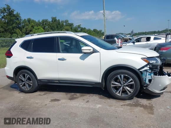 ✅ 2017 Nissan Rogue SV • VIN: JN8AT2MT9HW151511 • Lot: 43174081. Listed on IAAI with 104,937 mi. Free auction sales archive from the USA and detailed vehicle history report at DreamBid. Image 13.