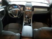 ✅ 2014 Ford Taurus SEL • VIN: 1FAHP2H85EG126945 • Lot: 69673325. Listed on Copart with 77,305 mi. Free auction sales archive from the USA and detailed vehicle history report at DreamBid. Image 8.