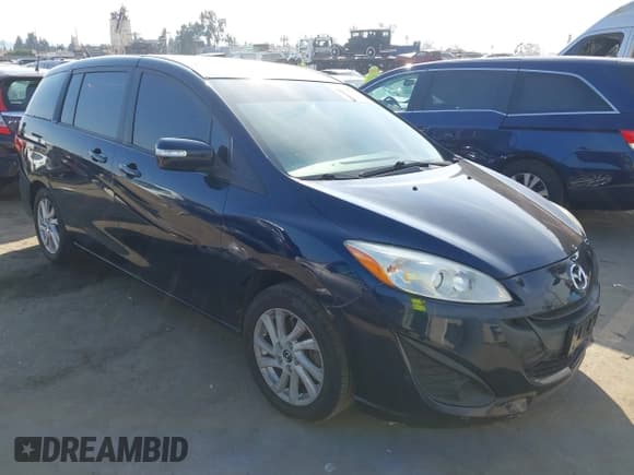 ✅ 2015 Mazda 5 Sport • VIN: JM1CW2BL7F0182965 • Lot: 43606712. Listed on IAAI with 150,777 mi. Free auction sales archive from the USA and detailed vehicle history report at DreamBid. Image 1.