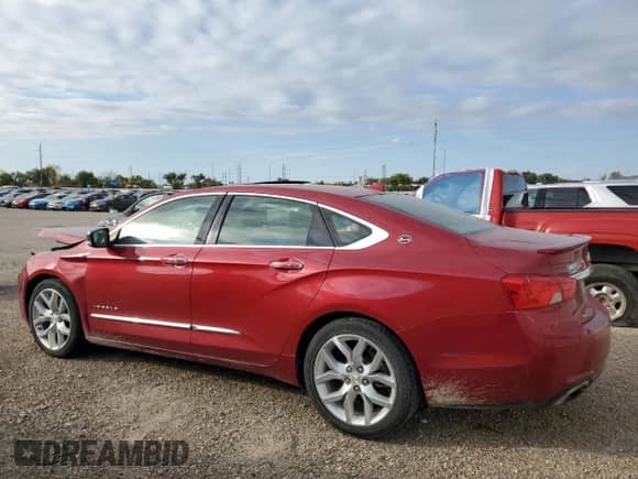 2014 Chevrolet Impala LTZ with VIN 1G1155S36EU145708, listed as a Copart auction lot 82423055 with 140,731 mi miles and Salvage title. Bid and sale history available at DreamBid. Image 2.
