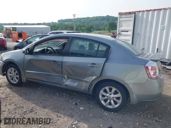 ✅ 2011 Nissan Sentra SL • VIN: 3N1AB6APXBL620456 • Lot: 42231832. Listed on IAAI with 124,430 mi. Free auction sales archive from the USA and detailed vehicle history report at DreamBid. Image 14.