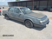 ✅ 1989 Oldsmobile Cutlass Ciera • VIN: 2G3AJ51NXK2439345 • Lot: 42128301. Wystawiony na IAAI z przebiegiem 241 434 mil. Bezpłatny archiwum sprzedaży aukcyjnych z USA i szczegółowy raport historii pojazdu na DreamBid. Zdjęcie 1.