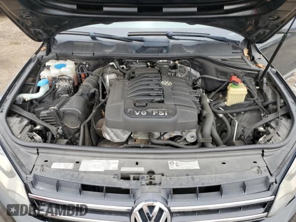 ✅ 2012 Volkswagen Touareg Sport • VIN: WVGFF9BP4CD005282 • Lot: 53793075. Listed on Copart with 116,098 mi. Free auction sales archive from the USA and detailed vehicle history report at DreamBid. Image 11.