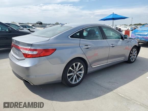 ✅ 2015 Hyundai Azera • VIN: KMHFG4JG4FA453156 • Lot: 86844795. Listed on Copart with 104,948 mi. Free auction sales archive from the USA and detailed vehicle history report at DreamBid. Image 3.
