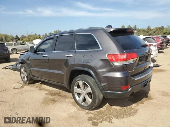 2014 Jeep Grand Cherokee Limited z VIN 1C4RJFBG1EC425802, wystawiony jako Copart lot #84869645 z przebiegiem 220 656 mil mil oraz Szkoda całkowita • Salvage title. Historia ofert i sprzedaży dostępna na DreamBid. Obrazek 2.