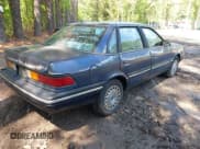 ✅ 1990 Ford Tempo • VIN: 1FAPP36X7LK127424 • Lot: 42101881. Wystawiony na IAAI z przebiegiem 70 846 mil. Bezpłatny archiwum sprzedaży aukcyjnych z USA i szczegółowy raport historii pojazdu na DreamBid. Zdjęcie 4.